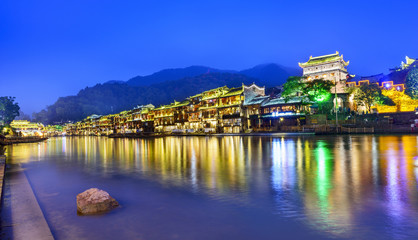 Obraz premium Fenghuang Ancient Town at night. Located in Fenghuang County. Southwest of HuNan, China.