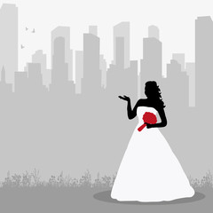 Obraz premium silhouette of the bride on the city background