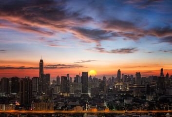 Obraz premium Panorama sunrise with Cityscape downtown for background.