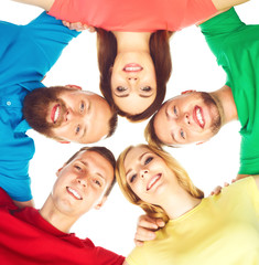 Group of happy students staying together.