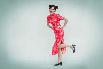 Asian woman with cheongsam. Chinese new year.