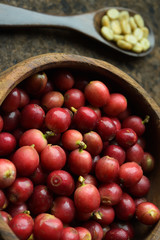 fresh coffee beans in wooden bowl