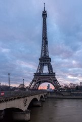 Fototapeta na wymiar The Eiffel tower at Paris from the river Seine in morning