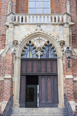 Fototapeta na wymiar Collegiate Church of the Holy Cross and St. Bartholomew,an entrance gate, Ostow Tumski, Wroclaw, Poland