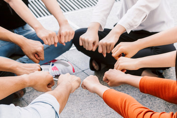 Fototapeta premium Group of team work people giving fist bump together.friendship concept
