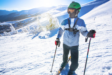 Man skier on a slope in the mountains