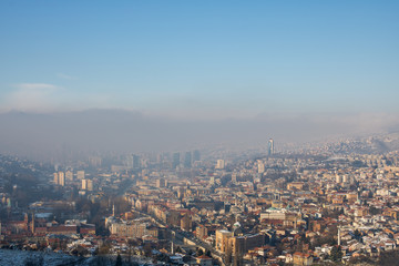 Fototapeta na wymiar Misty morning in Sarajevo, view from the White Fortress