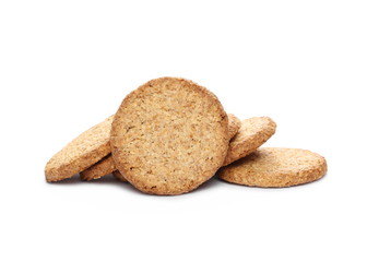 Round integral, wholewheat biscuits with coconut isolated on white background