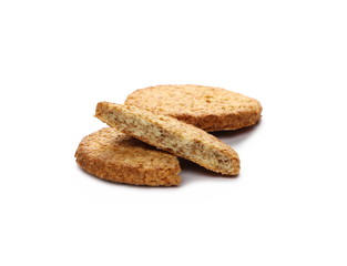 Round broken integral, wholewheat biscuits with coconut isolated on white background