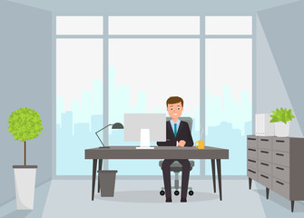 Businessman sitting in office interior.