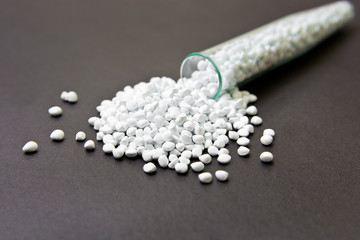 Fototapeta na wymiar Plastic pellets . Plastic raw materials in granules for industry.
