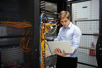 Young contemporary programmer checking system of data storage in mining farm
