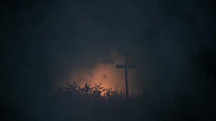 Grave Marked with a Cross Under a Storm