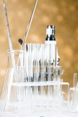 Microscope with lab glassware, science laboratory research concept