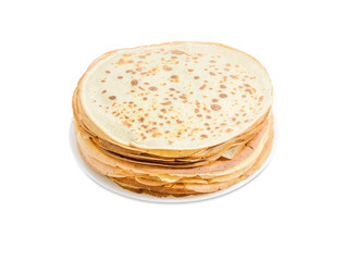 Stack of thin round pancakes on white dish