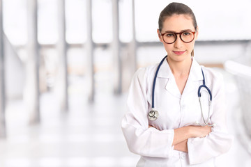 Portrait of medical female doctor on hospital background