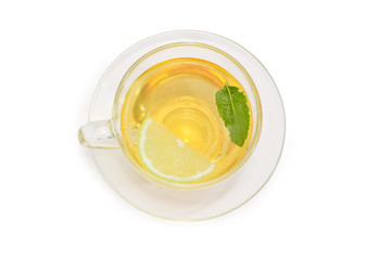 Top view of cup of tea with mint and lemon