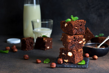 Classical American dessert - chocolate brownie with nuts.