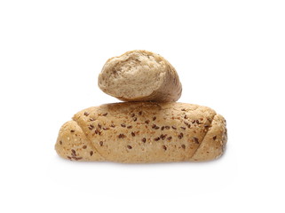 Fototapeta na wymiar Whole wheat bread roll slices with sesame and linseed isolated on white background