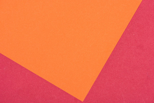 close-up shot of orange and purple paper layers for background