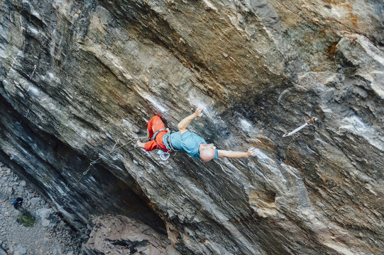 Man rock climbing on steepest granite route