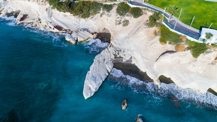 Aerial view of landmark big white chalk rock at Governor's beach, Limassol, Cyprus. Steep stone...