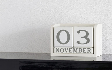 White block calendar present date 3 and month November