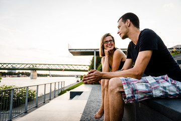 Woman with a bright smile gazing at boyfriend