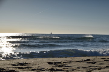 Isolated sailboat on the sea