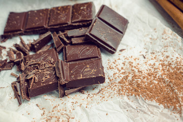 Chocolate bar with cacao powder. Selective focus.