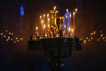 burning candles  on chandelier