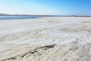 The gathering of ice from the river in early spring