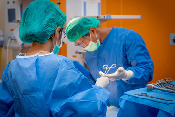 Medical physician doctor or Surgery team in operation room with lighting at hospital