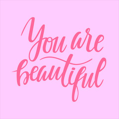 You are beautiful. Hand lettering drawing on the pink background on the theme of Valentine's Day.  illustration