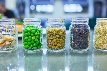 Food ingredients in jars vegetables, cereals