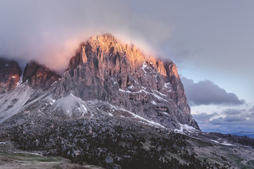Dolomites sunrise with fog
