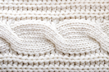 Fototapeta na wymiar Knitted texture. Pattern fabric made of wool. Background, copy space