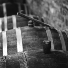 Vintage wine barrel in cellar / cellar with barrels for storage of wine