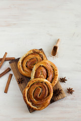 Cinnamon rolls on a light background