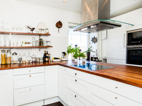 wooden kitchen counter top in modern fancy scandinavian kitchen