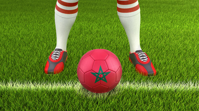 Man and soccer ball  with Moroccan flag. Image with clipping path