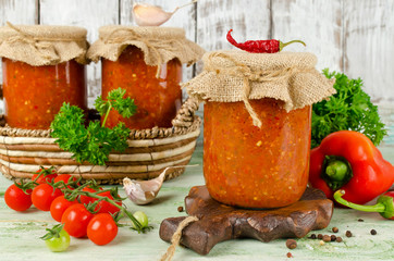 Homemade hot sauce adjika with vegetables