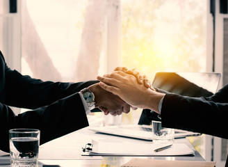 negotiations and business success concept, businessmen shaking hands or handshake in office after connection deal and agreement partner.