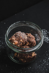 Homemade cocoa balls on black background.Dessert