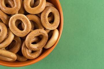 Bagels in a orange bowl