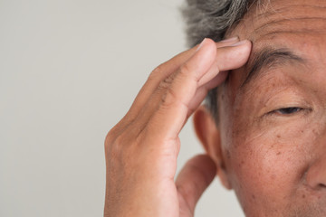 Fototapeta premium senior old man suffering from dementia or memory loss