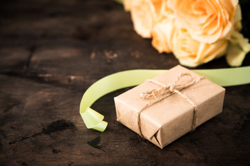 gift or present box and flowers. a gift for Valentine's day or a woman's day