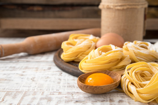 Traditional italian pasta Tagliatelle with ingredients. Homemade pasta tagliatelle with eggs