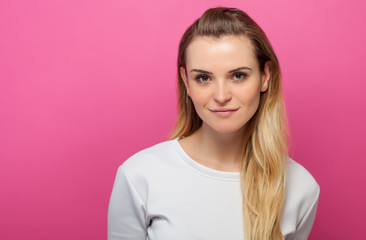 Fototapeta premium Portrait of girl on pink background