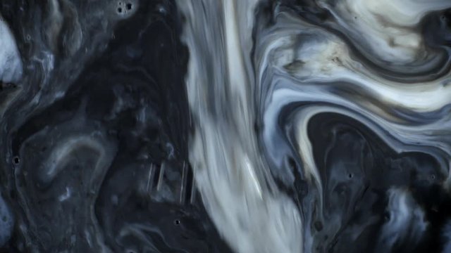 Abstract patterns of ink on water
